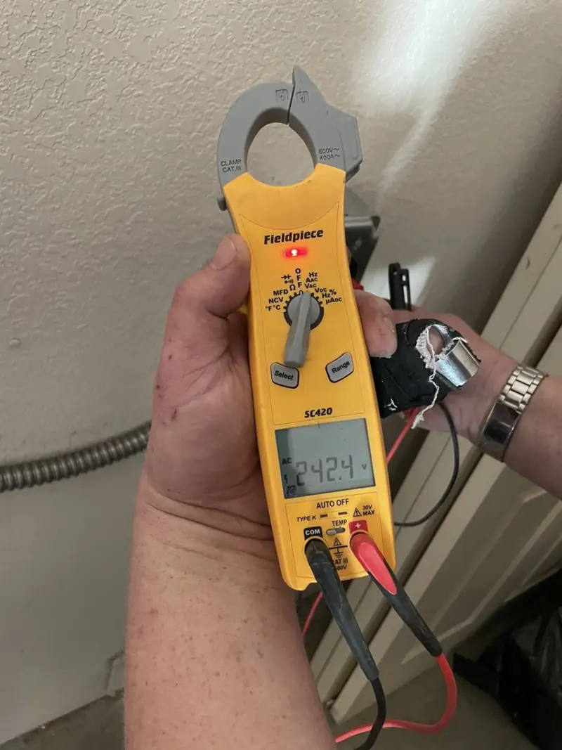 Voltage testing with clamp meter during Outlet Installation in Callender